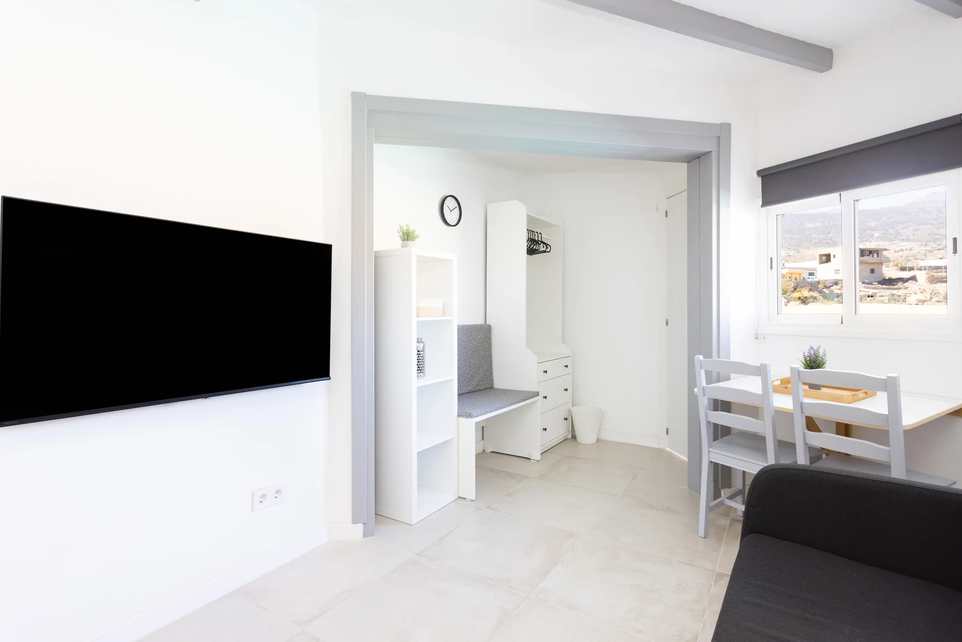 General view of sofa and TV